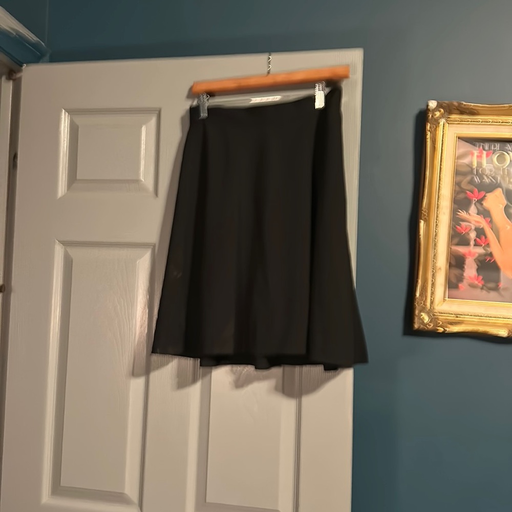 Black skater skirt short. Neimann Marcus. Size 10.